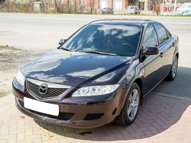 Черный Мазда 6, объемом двигателя 2 л и пробегом 220 тыс. км за 5999 $, фото 1 на Automoto.ua