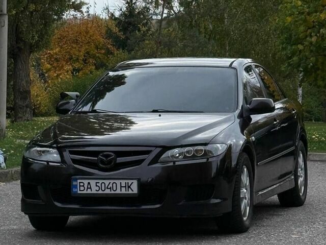 Чорний Мазда 6, об'ємом двигуна 2.3 л та пробігом 236 тис. км за 5600 $, фото 1 на Automoto.ua