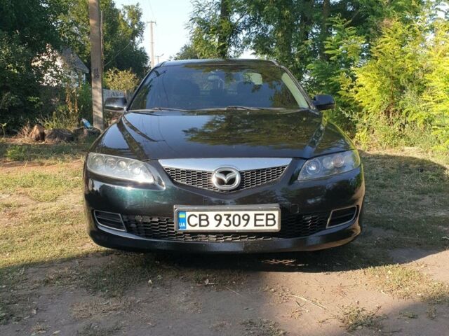 Черный Мазда 6, объемом двигателя 2 л и пробегом 248 тыс. км за 4500 $, фото 1 на Automoto.ua