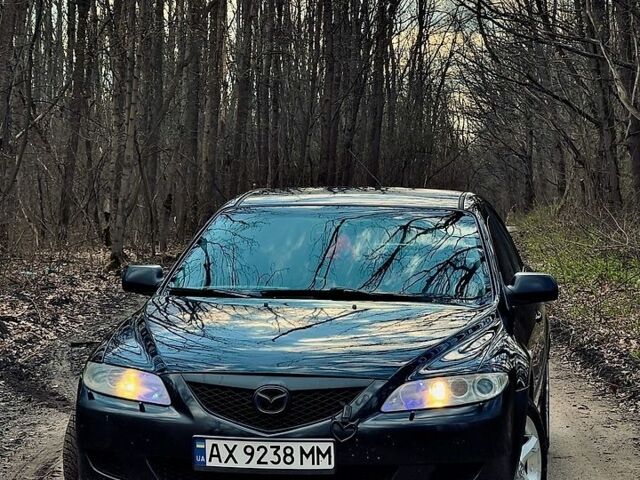 Черный Мазда 6, объемом двигателя 1.8 л и пробегом 259 тыс. км за 3500 $, фото 1 на Automoto.ua
