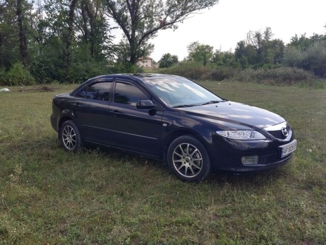 Черный Мазда 6, объемом двигателя 2 л и пробегом 140 тыс. км за 8500 $, фото 1 на Automoto.ua