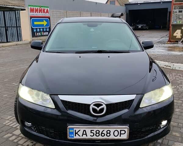 Черный Мазда 6, объемом двигателя 2 л и пробегом 190 тыс. км за 4600 $, фото 1 на Automoto.ua