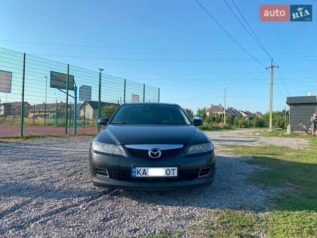 Черный Мазда 6, объемом двигателя 2 л и пробегом 338 тыс. км за 4500 $, фото 1 на Automoto.ua