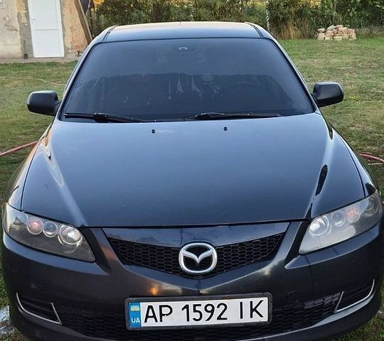 Черный Мазда 6, объемом двигателя 2 л и пробегом 412 тыс. км за 5000 $, фото 1 на Automoto.ua