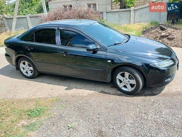 Черный Мазда 6, объемом двигателя 2 л и пробегом 312 тыс. км за 5000 $, фото 1 на Automoto.ua