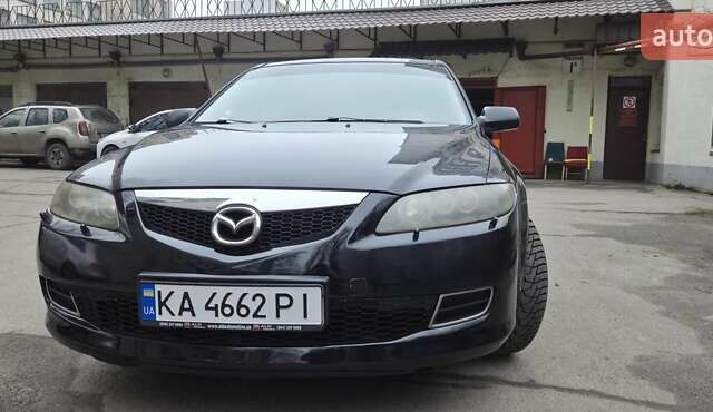 Черный Мазда 6, объемом двигателя 2 л и пробегом 266 тыс. км за 5200 $, фото 1 на Automoto.ua