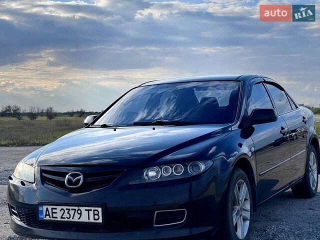 Черный Мазда 6, объемом двигателя 2 л и пробегом 321 тыс. км за 5100 $, фото 1 на Automoto.ua