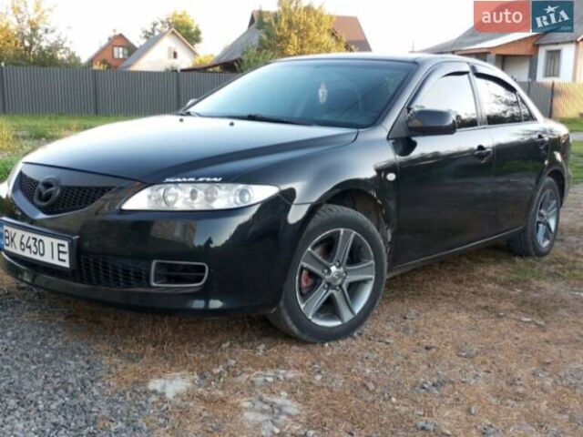 Черный Мазда 6, объемом двигателя 2 л и пробегом 352 тыс. км за 4500 $, фото 1 на Automoto.ua