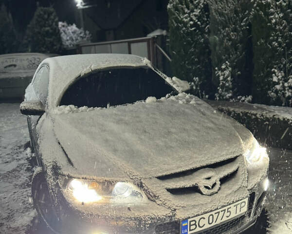 Черный Мазда 6, объемом двигателя 2.3 л и пробегом 226 тыс. км за 5999 $, фото 1 на Automoto.ua