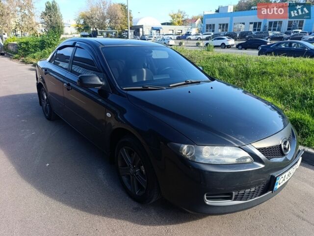 Черный Мазда 6, объемом двигателя 2 л и пробегом 254 тыс. км за 4800 $, фото 1 на Automoto.ua