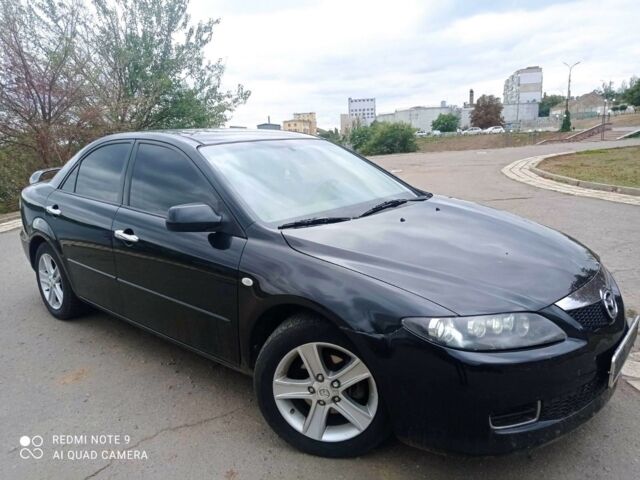 Черный Мазда 6, объемом двигателя 2 л и пробегом 115 тыс. км за 5800 $, фото 1 на Automoto.ua