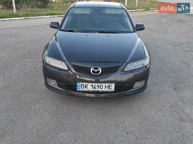 Черный Мазда 6, объемом двигателя 2 л и пробегом 319 тыс. км за 4150 $, фото 1 на Automoto.ua