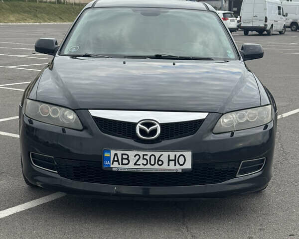 Черный Мазда 6, объемом двигателя 2 л и пробегом 200 тыс. км за 4000 $, фото 1 на Automoto.ua