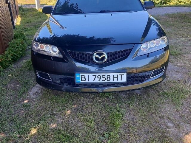 Черный Мазда 6, объемом двигателя 2 л и пробегом 296 тыс. км за 4950 $, фото 1 на Automoto.ua