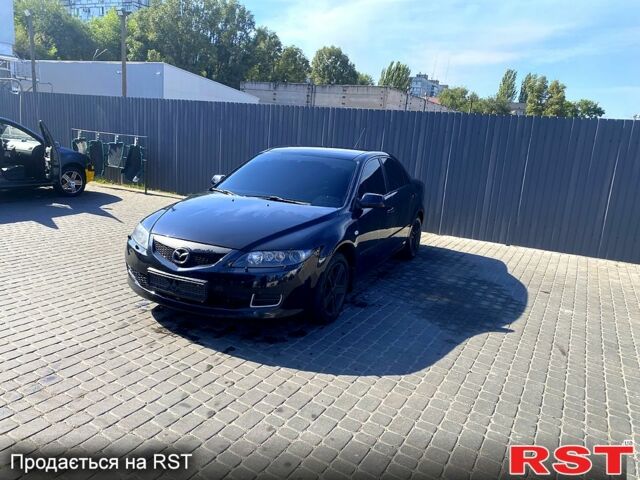 Черный Мазда 6, объемом двигателя 2 л и пробегом 167 тыс. км за 3800 $, фото 1 на Automoto.ua