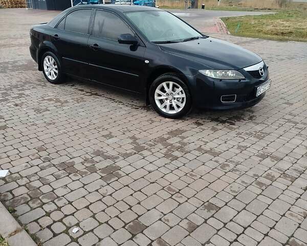 Черный Мазда 6, объемом двигателя 2 л и пробегом 254 тыс. км за 5200 $, фото 1 на Automoto.ua