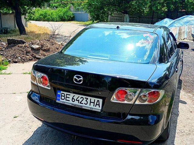 Чорний Мазда 6, об'ємом двигуна 2 л та пробігом 318 тис. км за 5000 $, фото 1 на Automoto.ua