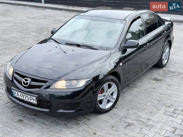 Черный Мазда 6, объемом двигателя 2 л и пробегом 187 тыс. км за 5700 $, фото 1 на Automoto.ua