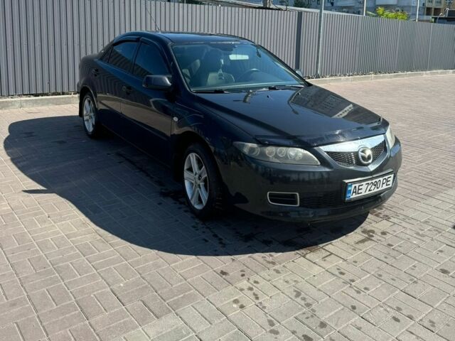 Черный Мазда 6, объемом двигателя 2 л и пробегом 302 тыс. км за 6500 $, фото 1 на Automoto.ua