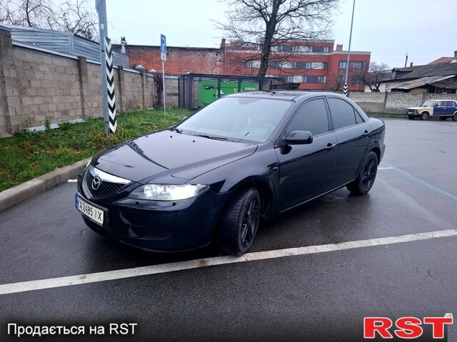 Черный Мазда 6, объемом двигателя 2 л и пробегом 335 тыс. км за 4650 $, фото 1 на Automoto.ua
