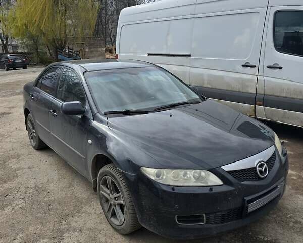 Черный Мазда 6, объемом двигателя 2 л и пробегом 240 тыс. км за 4300 $, фото 1 на Automoto.ua