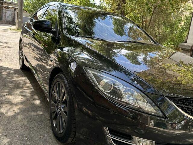 Черный Мазда 6, объемом двигателя 2 л и пробегом 232 тыс. км за 7600 $, фото 1 на Automoto.ua