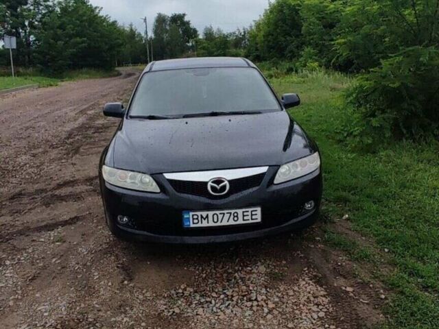 Черный Мазда 6, объемом двигателя 1.8 л и пробегом 240 тыс. км за 4900 $, фото 1 на Automoto.ua