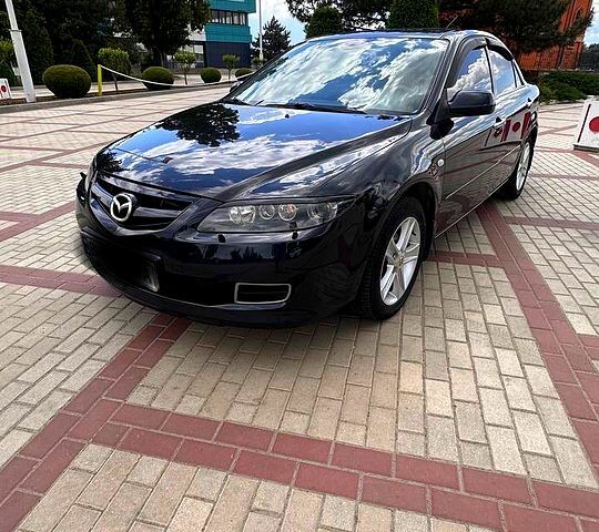 Черный Мазда 6, объемом двигателя 2 л и пробегом 235 тыс. км за 5500 $, фото 1 на Automoto.ua