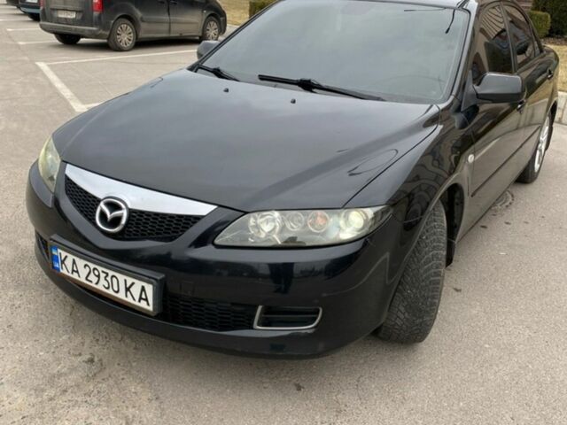 Черный Мазда 6, объемом двигателя 2 л и пробегом 240 тыс. км за 5800 $, фото 1 на Automoto.ua