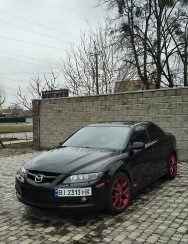Черный Мазда 6, объемом двигателя 2.3 л и пробегом 270 тыс. км за 8000 $, фото 1 на Automoto.ua
