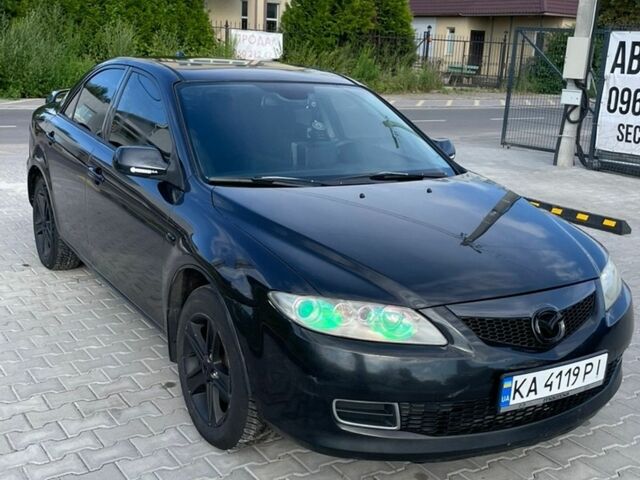 Черный Мазда 6, объемом двигателя 2 л и пробегом 280 тыс. км за 3800 $, фото 1 на Automoto.ua