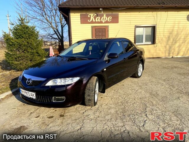 Черный Мазда 6, объемом двигателя 2 л и пробегом 225 тыс. км за 4900 $, фото 1 на Automoto.ua