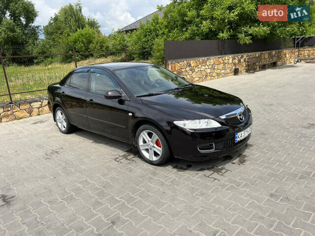 Черный Мазда 6, объемом двигателя 2 л и пробегом 221 тыс. км за 5200 $, фото 1 на Automoto.ua