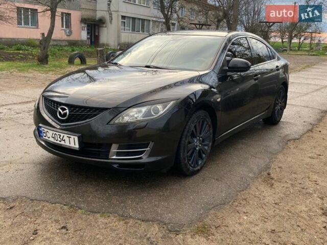 Черный Мазда 6, объемом двигателя 2 л и пробегом 300 тыс. км за 5900 $, фото 1 на Automoto.ua