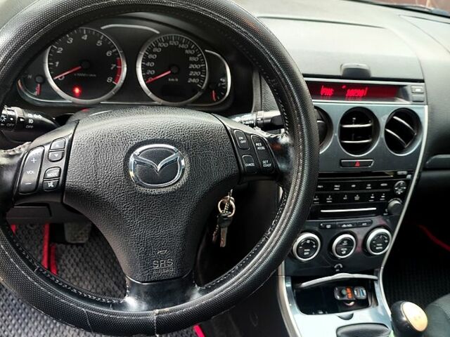 Черный Мазда 6, объемом двигателя 1.8 л и пробегом 320 тыс. км за 3900 $, фото 1 на Automoto.ua