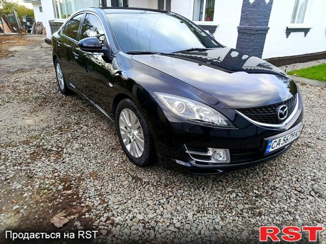 Черный Мазда 6, объемом двигателя 2 л и пробегом 160 тыс. км за 6800 $, фото 1 на Automoto.ua