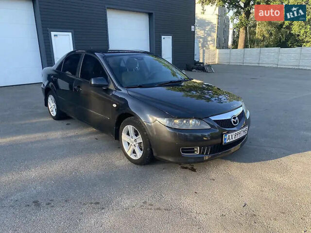 Чорний Мазда 6, об'ємом двигуна 1.8 л та пробігом 360 тис. км за 4300 $, фото 1 на Automoto.ua