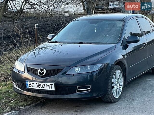 Черный Мазда 6, объемом двигателя 2 л и пробегом 264 тыс. км за 5400 $, фото 1 на Automoto.ua