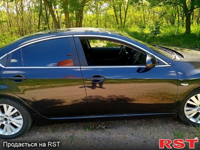 Черный Мазда 6, объемом двигателя 1.8 л и пробегом 248 тыс. км за 6500 $, фото 1 на Automoto.ua