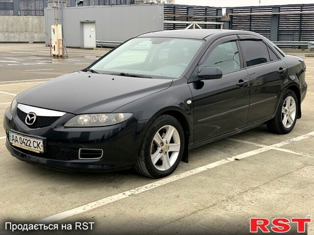 Черный Мазда 6, объемом двигателя 2 л и пробегом 209 тыс. км за 5550 $, фото 1 на Automoto.ua