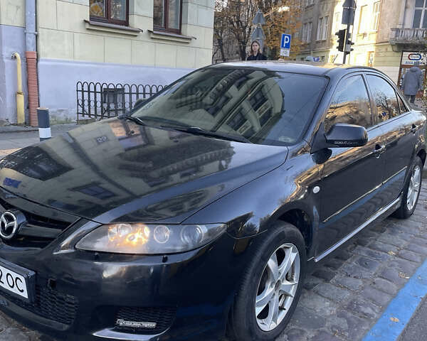 Черный Мазда 6, объемом двигателя 2.3 л и пробегом 269 тыс. км за 5300 $, фото 1 на Automoto.ua