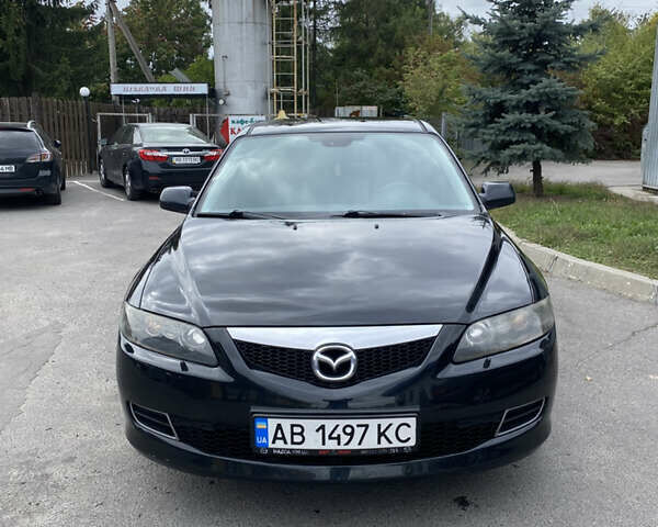 Черный Мазда 6, объемом двигателя 2 л и пробегом 268 тыс. км за 5200 $, фото 1 на Automoto.ua