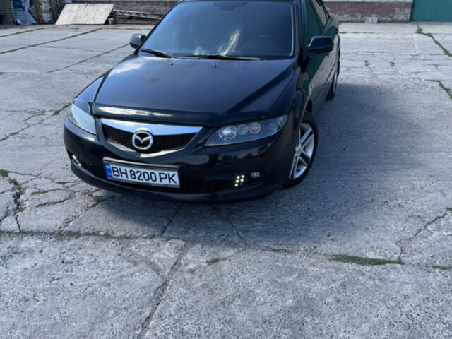 Черный Мазда 6, объемом двигателя 2 л и пробегом 325 тыс. км за 4600 $, фото 1 на Automoto.ua