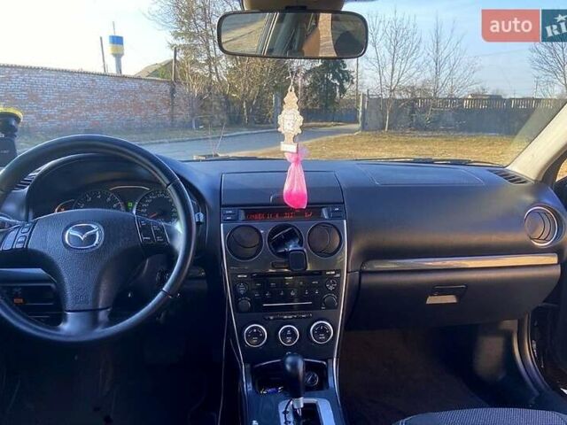 Чорний Мазда 6, об'ємом двигуна 2 л та пробігом 225 тис. км за 4900 $, фото 1 на Automoto.ua