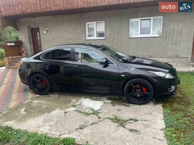 Черный Мазда 6, объемом двигателя 2 л и пробегом 370 тыс. км за 6300 $, фото 1 на Automoto.ua