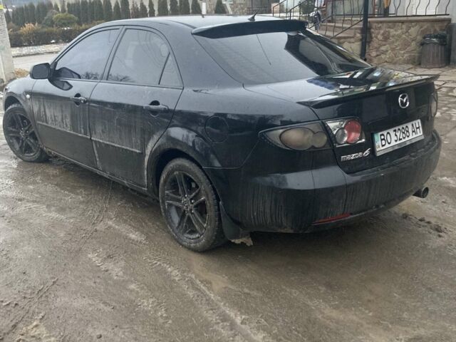 Черный Мазда 6, объемом двигателя 1.8 л и пробегом 322 тыс. км за 4000 $, фото 1 на Automoto.ua