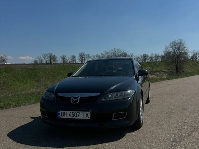 Черный Мазда 6, объемом двигателя 2 л и пробегом 240 тыс. км за 5000 $, фото 1 на Automoto.ua