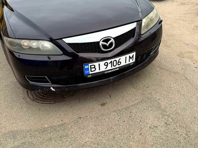 Черный Мазда 6, объемом двигателя 2 л и пробегом 250 тыс. км за 4700 $, фото 1 на Automoto.ua