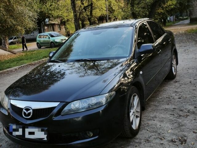 Чорний Мазда 6, об'ємом двигуна 2 л та пробігом 247 тис. км за 5289 $, фото 1 на Automoto.ua