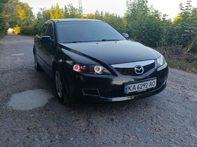 Черный Мазда 6, объемом двигателя 2 л и пробегом 270 тыс. км за 6000 $, фото 1 на Automoto.ua
